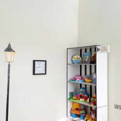 Rockinghorse Home Day Care - Our dedicated Paris themed playroom has its own little "toy shoppe". Ok it's really a shelf with toys, but to children it's a shelf of fun.
