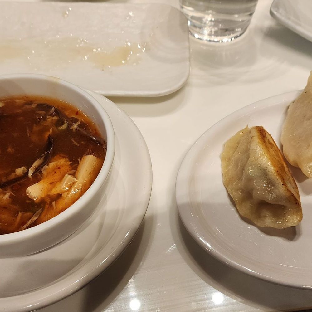Super Dumpling - Hot sour soup and pan fried bun and chicken dumplings - Noodles Near Me - Orange, California Super Dumpling - Hot sour soup and pan fried bun and chicken dumplings - Noodles Near Me - Orange, California
