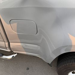 Raven Bros Auto Painting & Body Repair - big dent      (before)