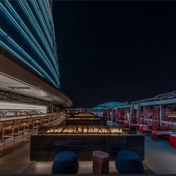 Spire 73 - Bar with open-air top night view - Cocktail Bars Near Me - Los Angeles, California Spire 73 - Bar with open-air top night view - Cocktail Bars Near Me - Los Angeles, California