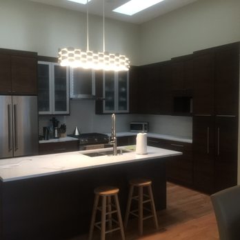 Adept Electric & Construction Services - hung light fixture - Electricians Near Me