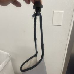 Tractor Supply - Do better! Both aprons in the dog washing stations broken. The neck is tied so you can not even put it over your head.