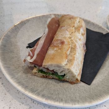 Kaffeine Espresso Bar - Iberico sandwich. This one has manchego cheese and arugula. - Coffee & Tea Near Me - Redondo Beach, California