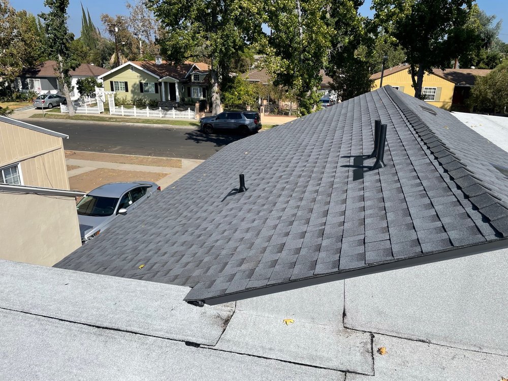 Slide of Golden Team Roofing