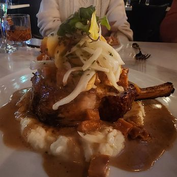 Ceron Kitchen - Porkchop over a bed of mashed potatoes, topped with roasted sweet potatoes and onions. Delicious!!!!! - New American Near Me - Alameda, California