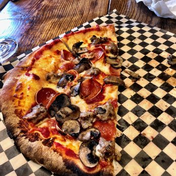 Off the Grid Pizza - Meat and Shrooms pizza. Pepperoni, Italian sausage and fresh mushrooms made for a yummy pizza. - Food Trucks Near Me Off the Grid Pizza - Meat and Shrooms pizza. Pepperoni, Italian sausage and fresh mushrooms made for a yummy pizza. - Food Trucks Near Me