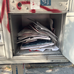 US Post Office - The parcel locker in my building's cluster box, 04 Sep '25. USPS has abandoned even more important mail in this locker than the pic shows.