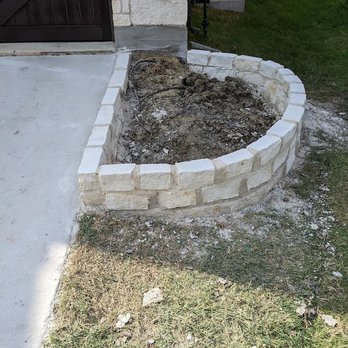 Pristine Landscaping and Lighting. - Stone work looks nice.  Can see the drip lines inside destroyed.  Then just mulched over, instead of fixing - Landscaping Near Me