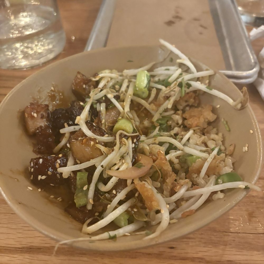 Bartaco - " pork belly crispy rice bowl   How much I could eat before I couldn't take anymore and I eat some spicy chips and medium salsa - Tacos Near Me - Charleston, South Carolina