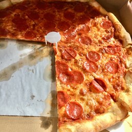 a slice of pepperoni pizza a slice of pepperoni pizza