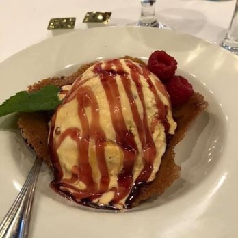 Season's At Highland Lake - Pecan ice cream topped with a pomegranate reduction in a praline bowl - New American Near Me - Flat Rock, North Carolina Season's At Highland Lake - Pecan ice cream topped with a pomegranate reduction in a praline bowl - New American Near Me - Flat Rock, North Carolina