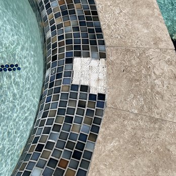 Backyard Amenities - a swimming pool with a tile border - General Contractors Near Me - Baytown, Texas Backyard Amenities - a swimming pool with a tile border - General Contractors Near Me - Baytown, Texas