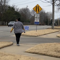 Goodwill Industries - Employees removing the Goodwill branded 50% off clothing signs that the manager claimed "they don't use".