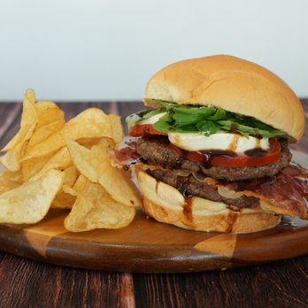 Behemoth Burger - 1/2 Pound Ribeye Burger, Fresh Basil, Tomato, Fresh Mozzarella Cheese, Crispy Prosciutto & Balsamic Drizzle on a Fresh Baked Bun. - Burgers Near Me - Simi Valley, California