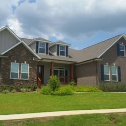 Gutter-Runner - New gutter install . Musket brown gutters on white facia .