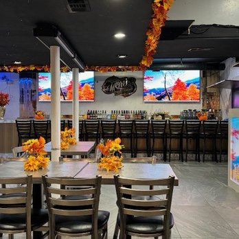 El Meneo Restaurant & Lounge - Colorful fall decorations and large bar area. - Beer Bar Near Me - Hollywood, Florida