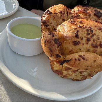 The Restaurant at Ponte - Free Bread with green onion sauce, the pairing green onion sauce is very good! - New American Near Me - Temecula, California