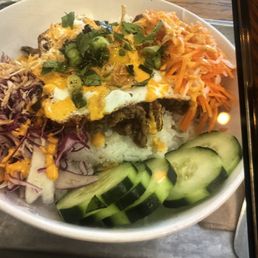 Rice bowl with pork and a fried egg on top :) Rice bowl with pork and a fried egg on top :)