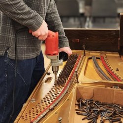 McGrew Piano Services - Piano rebuild work: replacement of tuning pins prior to restringing.