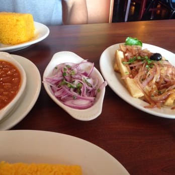 The Chicken House - Yuca with onions, onion jalapeno lime salsa, stewed pinto beans - Peruvian Near Me - Newark, Delaware The Chicken House - Yuca with onions, onion jalapeno lime salsa, stewed pinto beans - Peruvian Near Me - Newark, Delaware