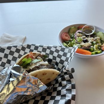 Zuki's Pita - Gyro combo (with salad). Excuse the bite from the gyro, I was hungry. - Mediterranean Near Me - Phoenix, Arizona Zuki's Pita - Gyro combo (with salad). Excuse the bite from the gyro, I was hungry. - Mediterranean Near Me - Phoenix, Arizona