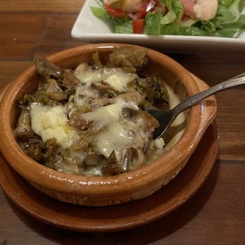 Barcelona Tapas - Brussel sprouts with pancetta, garlic, sherry, and havarti cheese - Tapas/Small Plates Near Me - New Orleans, Louisiana