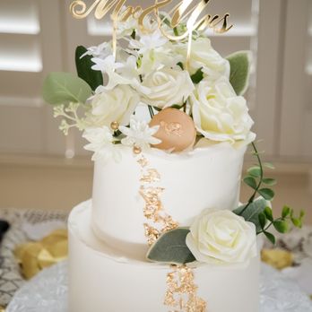 La Farfalla Bakery - Wedding cake with a top tier of Tiramisu and Fruit Cream cake on the bottom tier. - Bakeries Near Me - Fremont, California La Farfalla Bakery - Wedding cake with a top tier of Tiramisu and Fruit Cream cake on the bottom tier. - Bakeries Near Me - Fremont, California