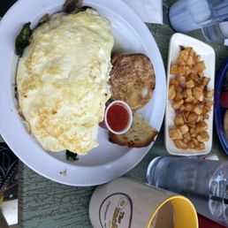 Egg white spinach omelette and a side of home fries! Egg white spinach omelette and a side of home fries!