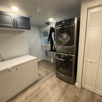 Morning Bird Construction - a washer and dryer in a laundry room - General Contractors Near Me
