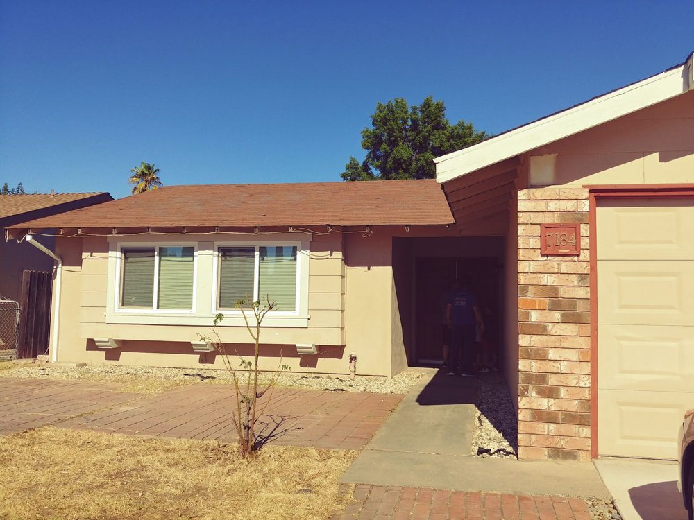 Slide of Titan Roofing Solutions