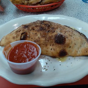 A Slice of the 80's - Calzone, dough was really hard - Pizza Near Me - Bradford, Pennsylvania