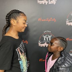Family Cutz - Cousins Day! Neatly braided styles using quality products. Side view.
