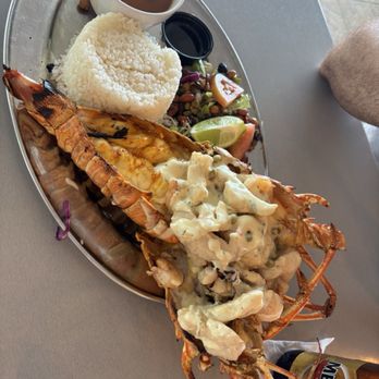 La Parrilla - Lobster with grouper and shrimp w/ Gouda cheese sauce. - Latin American Near Me - Luquillo, Puerto Rico La Parrilla - Lobster with grouper and shrimp w/ Gouda cheese sauce. - Latin American Near Me - Luquillo, Puerto Rico