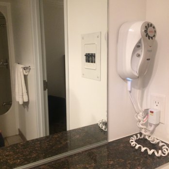 Pines Country Inn - There is this extra little bar area in the bathroom for getting ready - Hotels Near Me - Owosso, Michigan Pines Country Inn - There is this extra little bar area in the bathroom for getting ready - Hotels Near Me - Owosso, Michigan