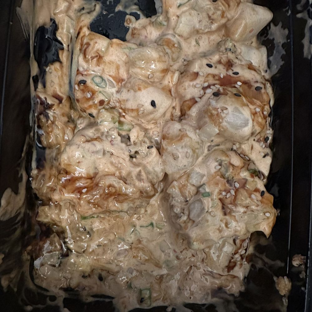 PokiMX - Can't even see the rolls. DRENCHED in spicy Mayo. One bite made me nauseous! - Poke Near Me - San Fernando, California