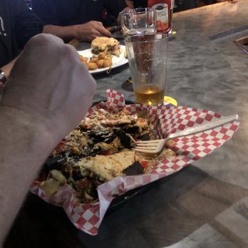 Sand Trap Grill & Bar - a plate of food and a glass of beer - Bars Near Me - North Royalton, Ohio Sand Trap Grill & Bar - a plate of food and a glass of beer - Bars Near Me - North Royalton, Ohio