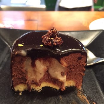 Cañete - Chocolate mouse on a biscuit infused with Caramelized banana topped with edible gold flakes - Tapas/Small Plates Near Me - Barcelona, B