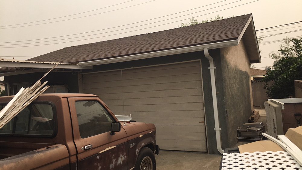 Slide of Lopez Roofing