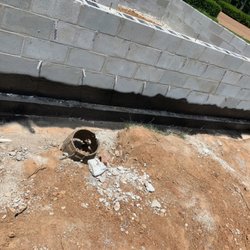 Barrier Waterproofing Systems - Sealing walls for a new construction home.  Brockets will start when membrane dries.