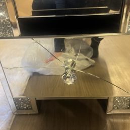 Nightstand that United Moving Solutions broke