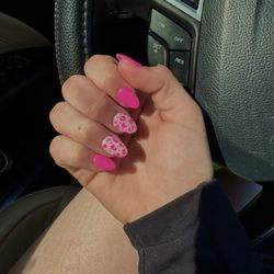 The Nail Bar - Got my nails and toes done. The people were very nice & welcoming. Was my first first coming here and definitely won't be my last!