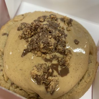 Crumbl - Danbury - Peanut butter cup cookie topped with Reese's -- glaze still glistening - Bakeries Near Me - Danbury, Connecticut Crumbl - Danbury - Peanut butter cup cookie topped with Reese's -- glaze still glistening - Bakeries Near Me - Danbury, Connecticut