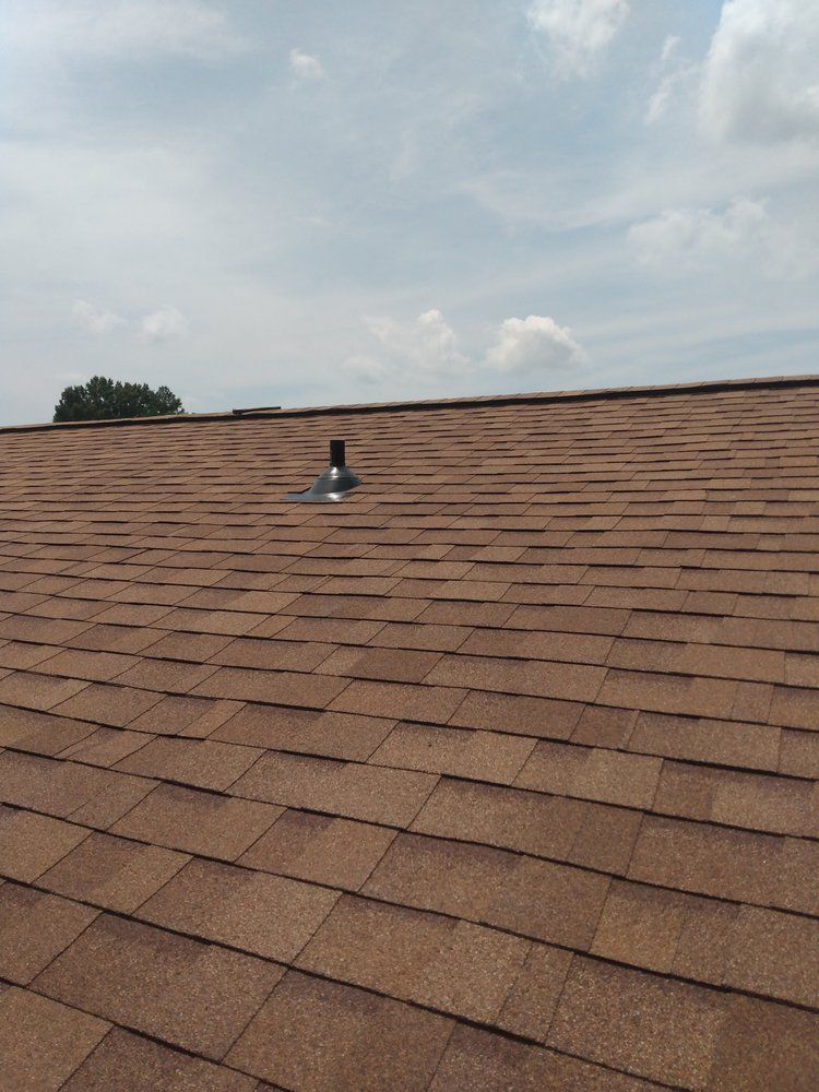 Slide of UnZucky Roofing