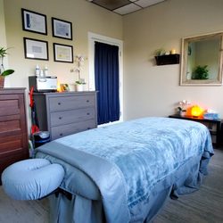 Jessica Buuck, CMT - Comfortable, ADA compliant hydraulic massage table with heating pad for comfort.