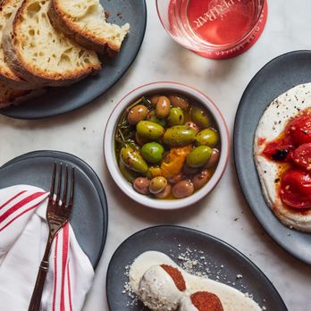 AperiBar - A collection of antipasto dishes plated - Italian Near Me - New York, New York