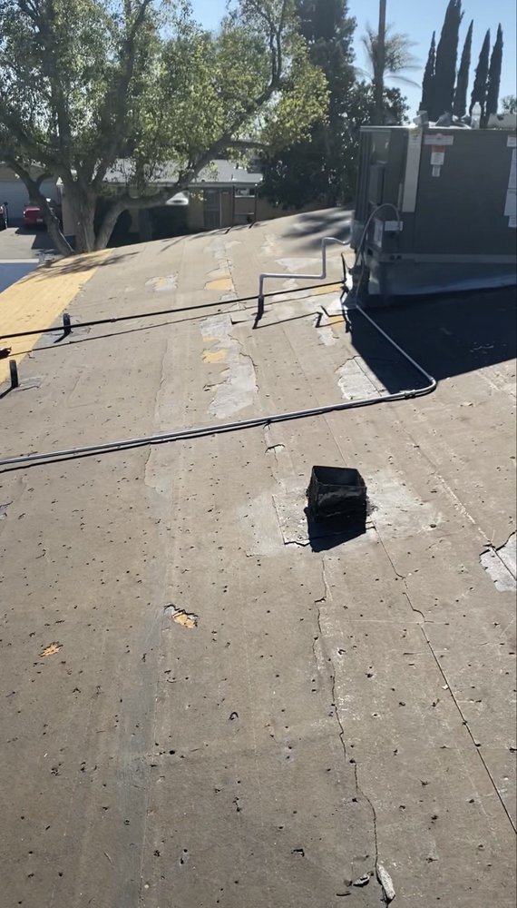 Slide of USA Roofing Maintenance