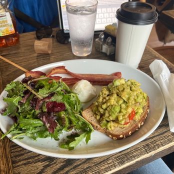 Cafe Dolma - Avocado toast with a side of hickory smoked bacon and a poached egg also a medium size chamomile tea. - Coffee & Tea Near Me - Jersey City, New Jersey