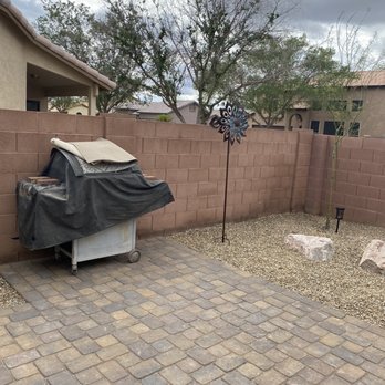 Balance Landscaping - a patio with a grill and a fence - Landscaping Near Me Balance Landscaping - a patio with a grill and a fence - Landscaping Near Me