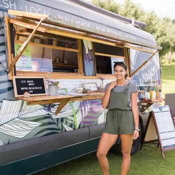 Humbowl Wagon - a woman standing in front of a food truck - Acai Bowls Near Me - Paia, Hawaii Humbowl Wagon - a woman standing in front of a food truck - Acai Bowls Near Me - Paia, Hawaii