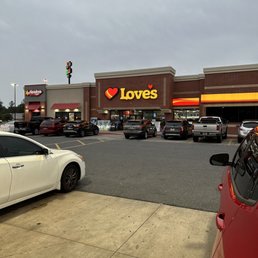 the parking lot of a love's travel stop the parking lot of a love's travel stop
